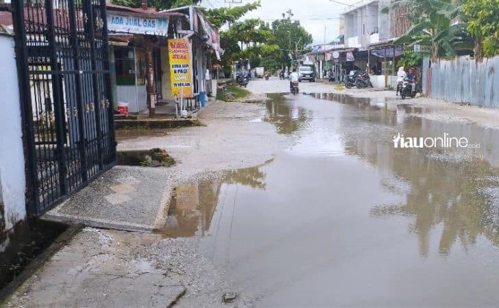 Banjir-jalan-rusak-menuju-TPS.jpg