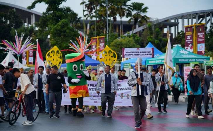 KPU Riau Pertama Kali Gelar Jalan Santai dengan Konsep Karnaval 2