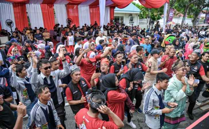 KPU Riau Pertama Kali Gelar Jalan Santai dengan Konsep Karnaval 6