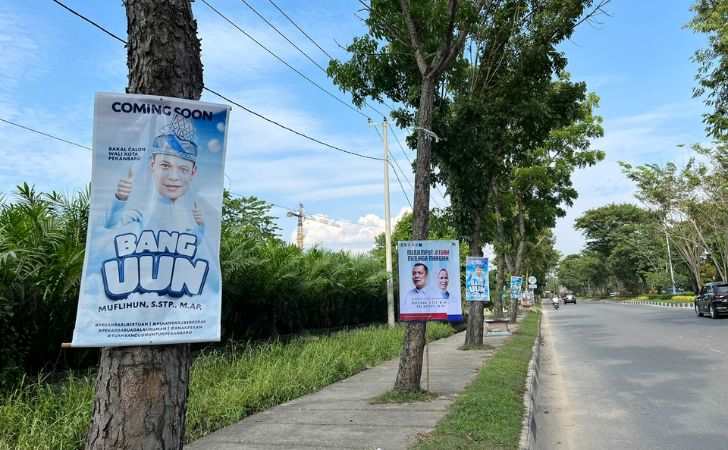 Banner-Bang-Uun-Rusak-Pohon-Sepanjang-Jalan-Arifin-Ahmad.jpg