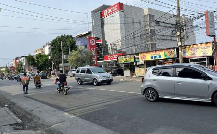 Warga-Senang-Jalan-Ahmad-Yani-Kembali-Mulus-Pasca-Perbaikan-Pipa-Oleh-Tirta-Siak.jpg